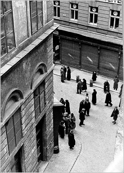 Jews in Vienna having their documents examined at an intersection